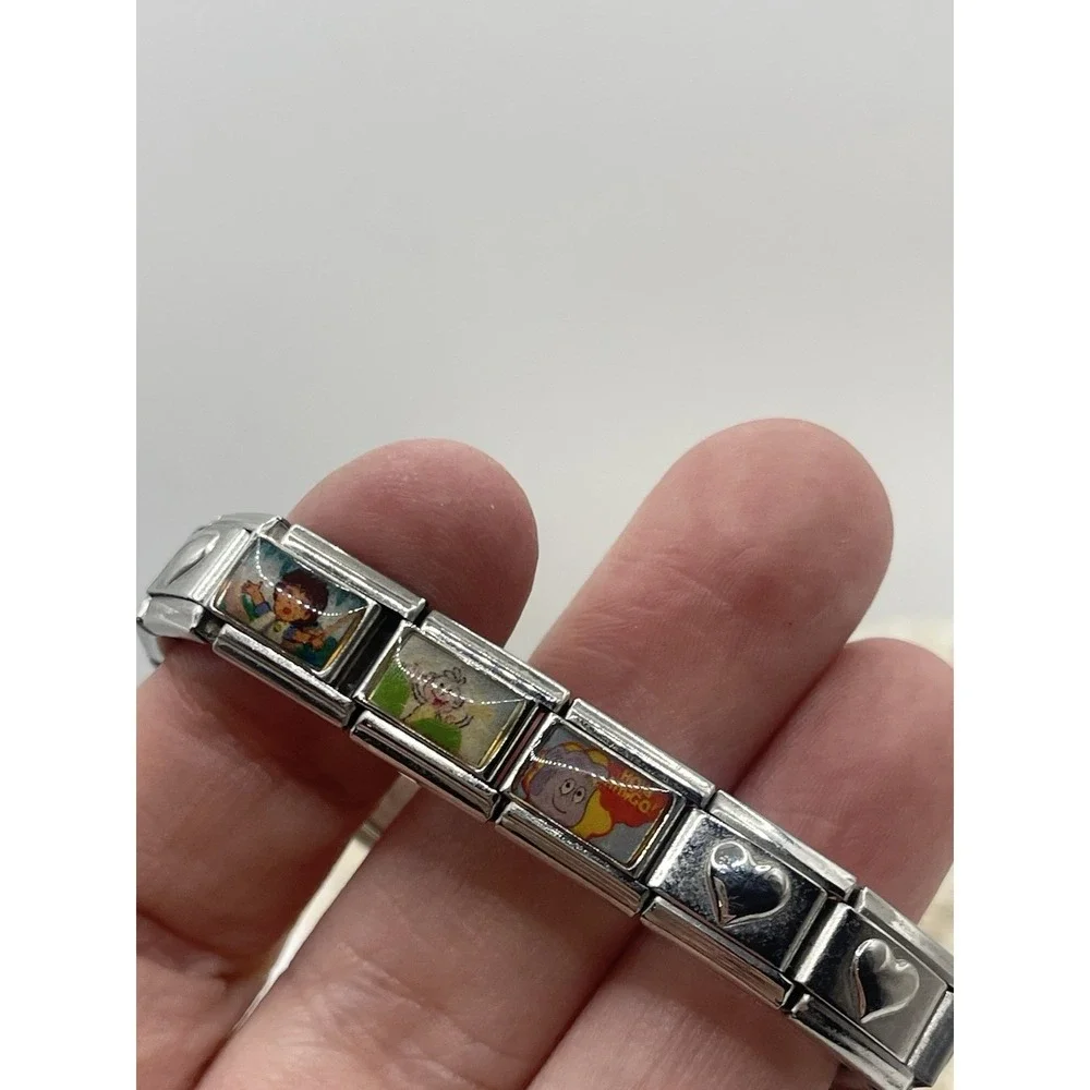 Dolceoro‎ Charm bracelet - hearts. Silver tone, expanding Dora The Explorer